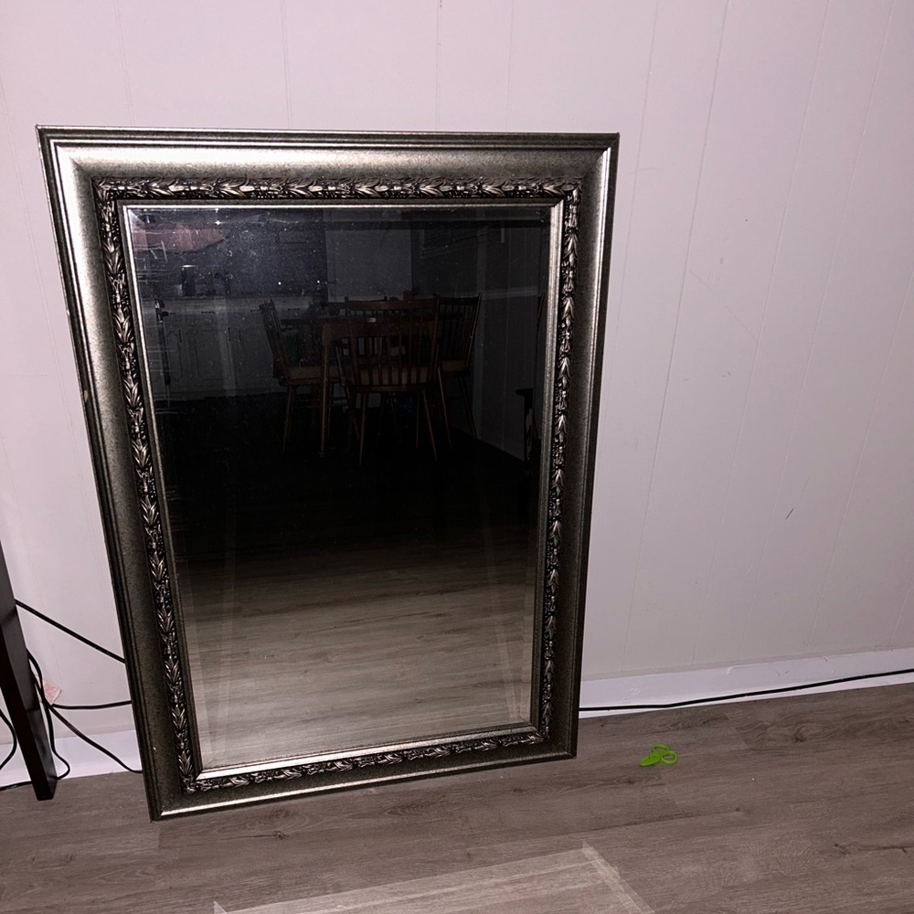 Large mirror . Probably around 3ft tall , heavy and sturdy